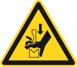 Warnzeichen - Warnung vor Quetsc ... chen den Werkzeugen einer Presse